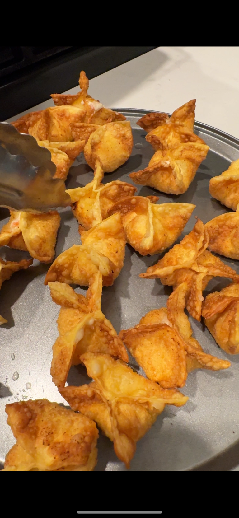 Golden brown Crab Rangoons fried until crispy with bubbly wonton wrappers and a creamy takeout style filling. Better than Chinese takeout and freshly made at home.