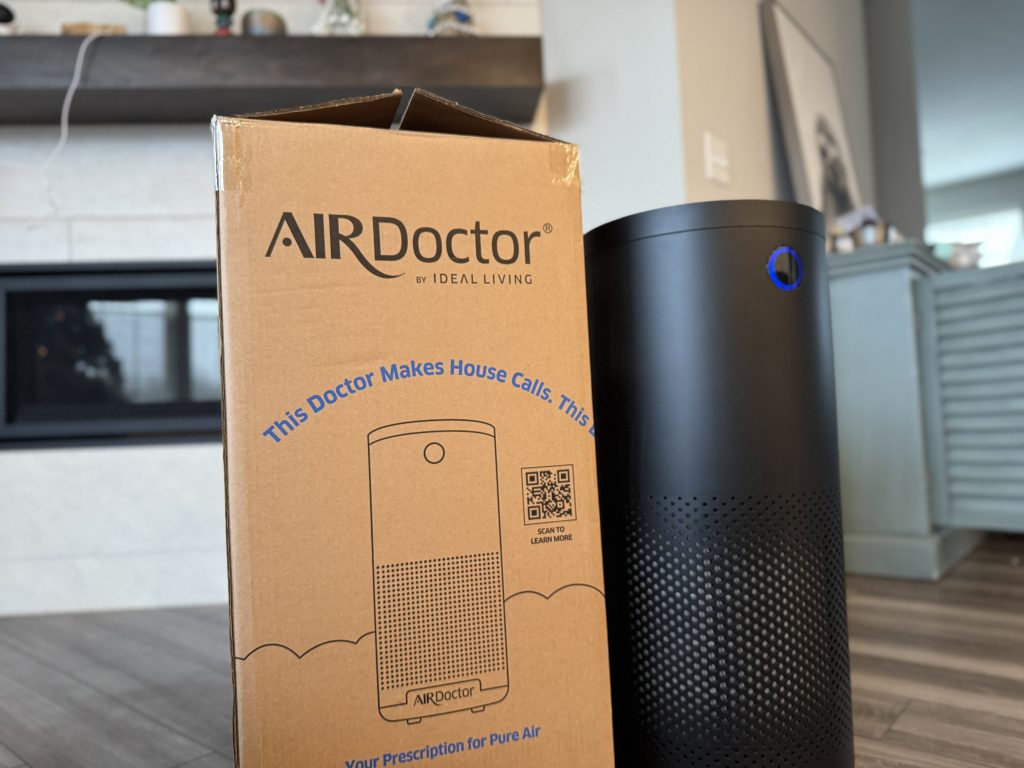 AirDoctor 4000 air purifier with original box shown in home setting for review
