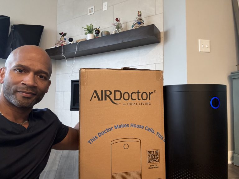 Man reviewing AirDoctor 4000 air purifier at home for allergy relief