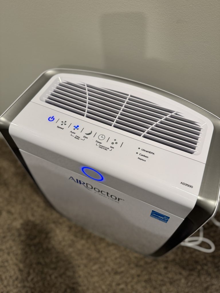 AirDoctor 3500 air purifier front view with air quality indicator for allergy sufferers