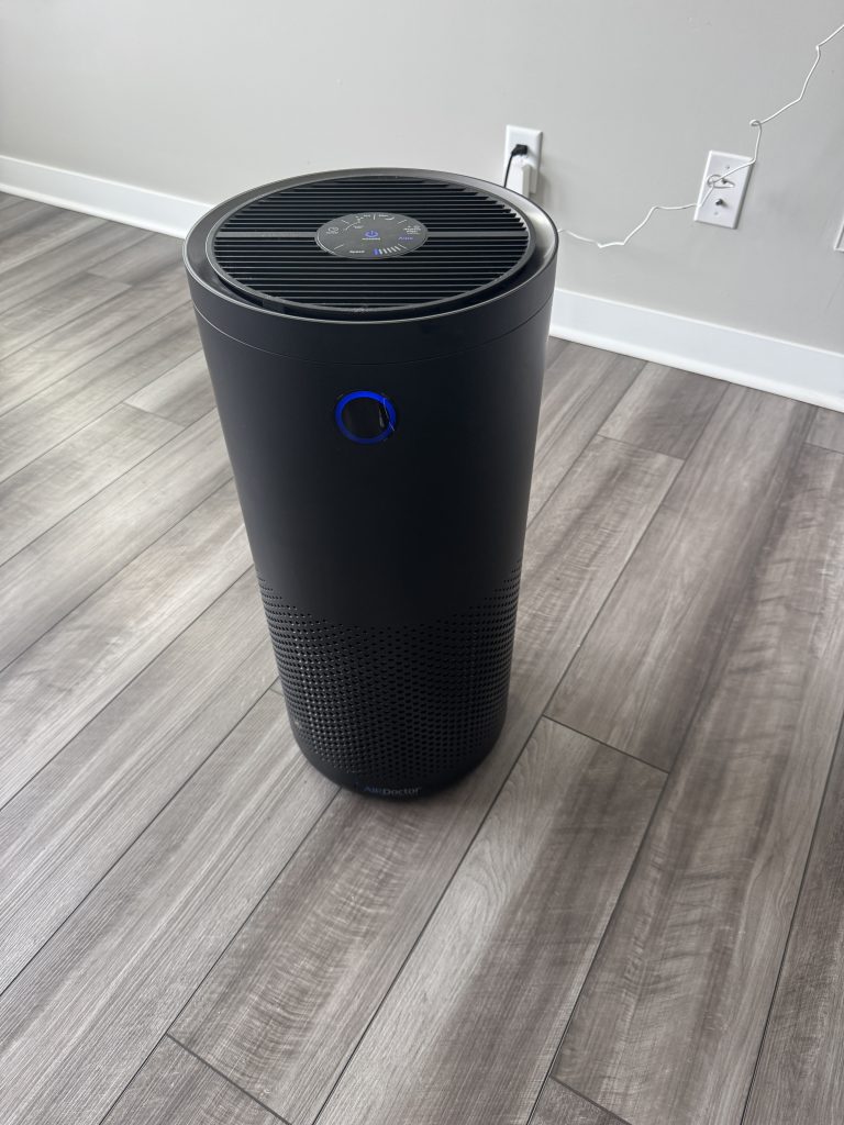 AirDoctor 4000 air purifier running in a large living room